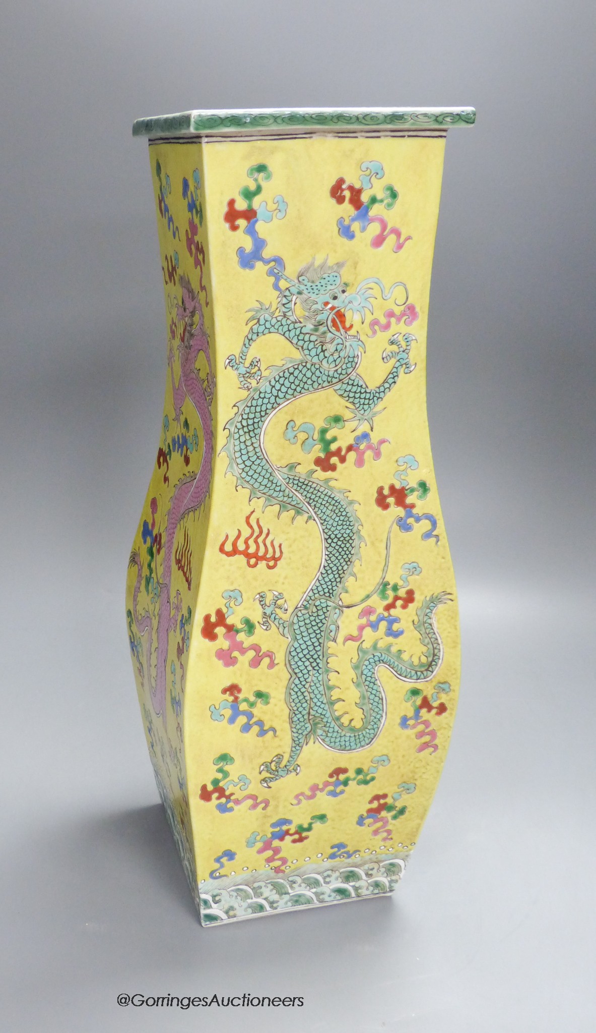 A Chinese yellow ground 'dragon' square baluster vase, 43.5cm high